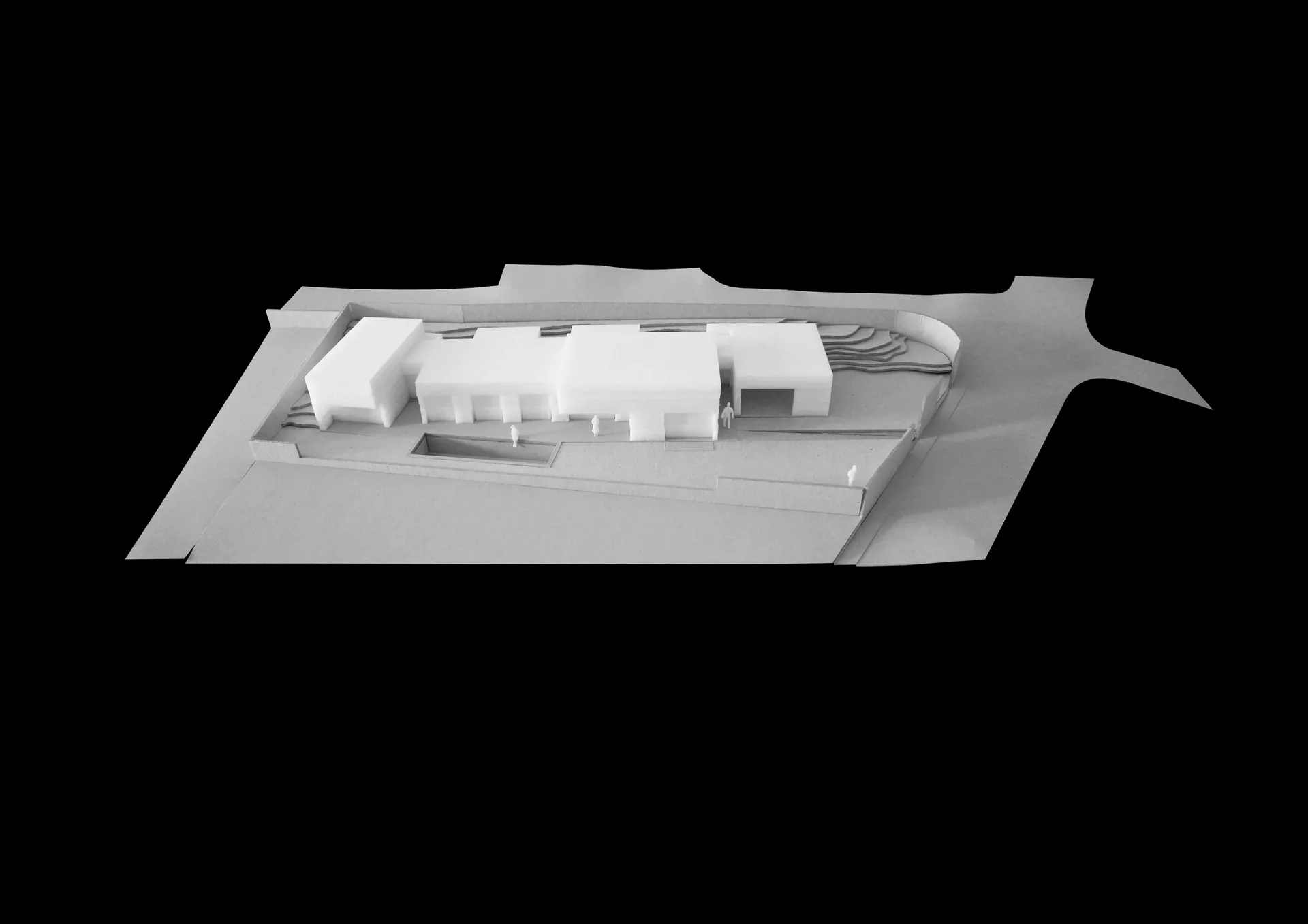 Maquete da Casa nos Saltos em vista aérea, com o arruamento de acesso a nascente.